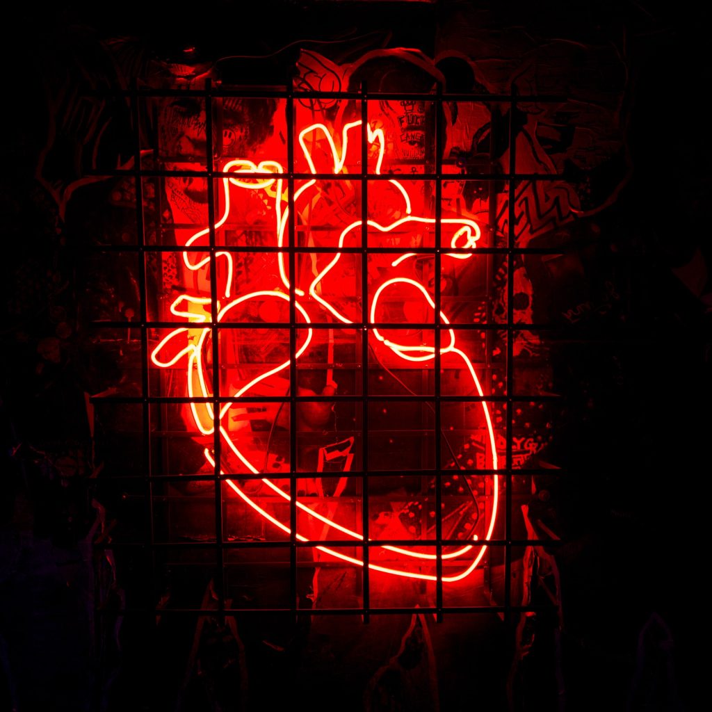 Photo of neon-lit heart by Leon Collett, via Unsplash.